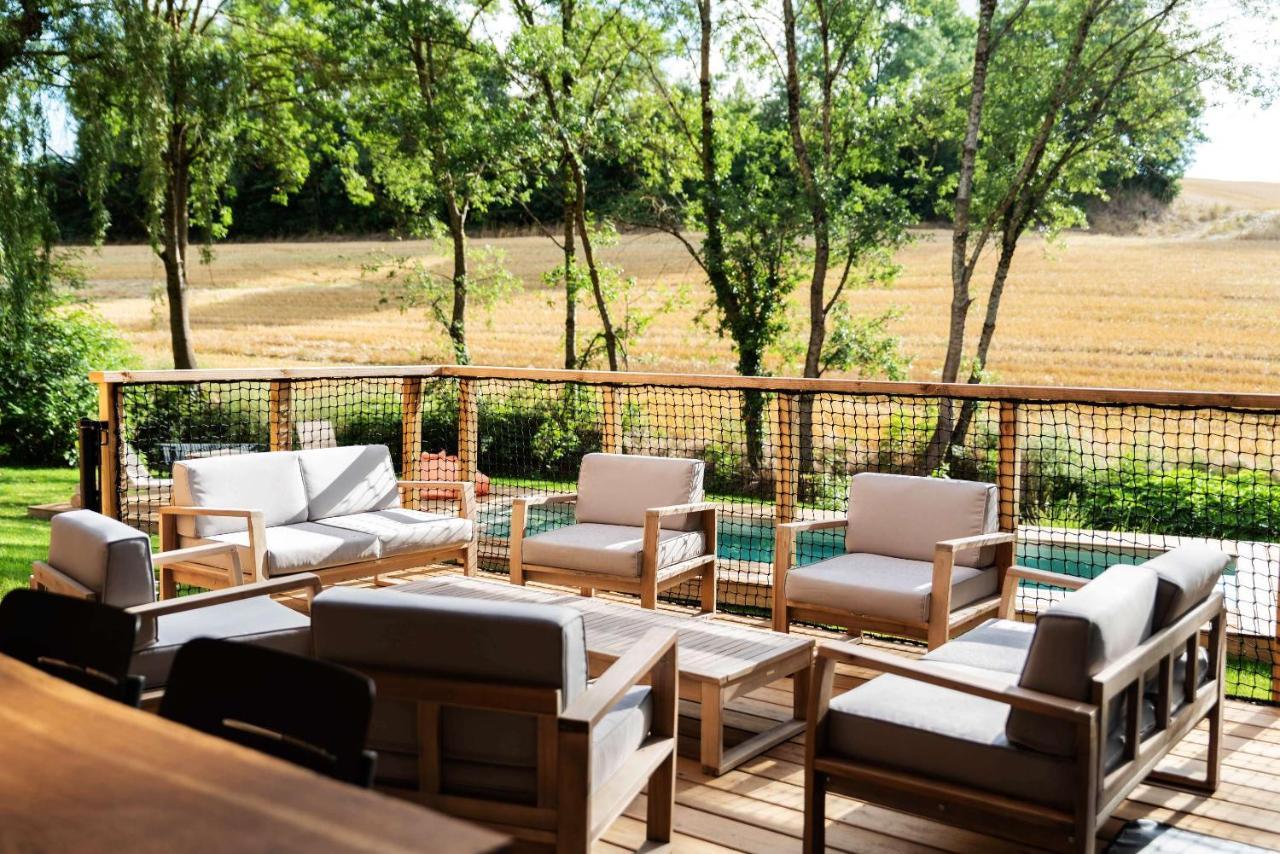 Dans Les Arbres Acomodação com café da manhã Lanta Exterior foto